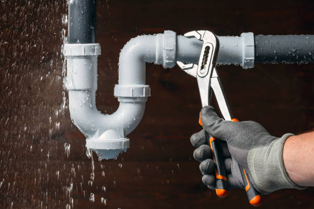 Professional Emergency Plumber technician working in Lake Mills, WI